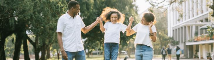 family of three outside