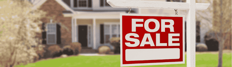for sale sign in yard