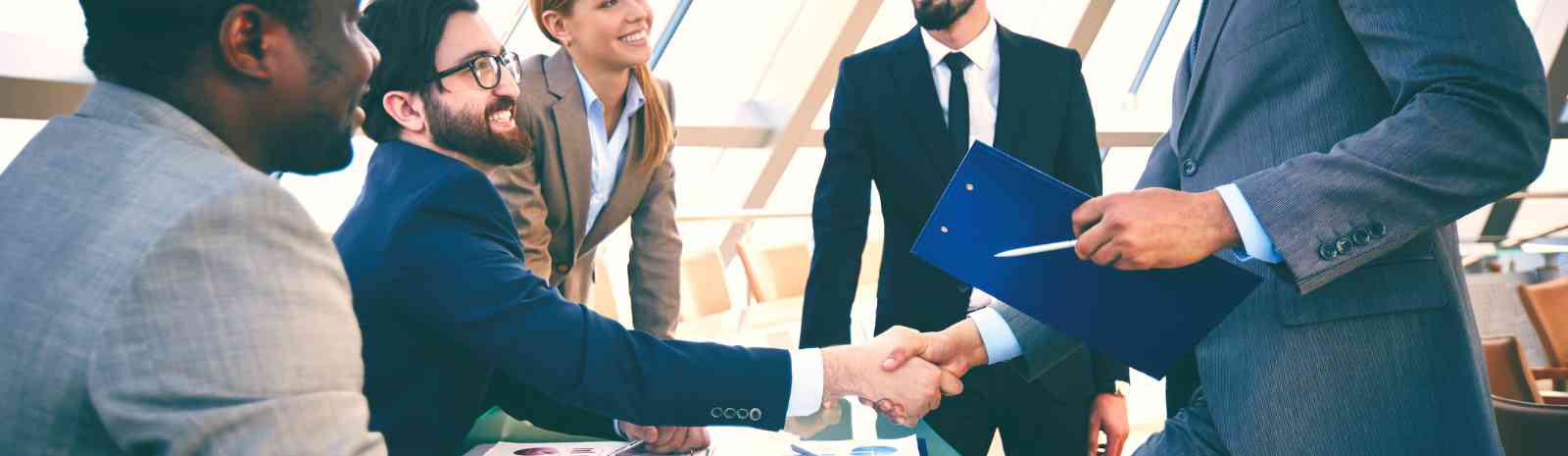 Business team shaking hands.
